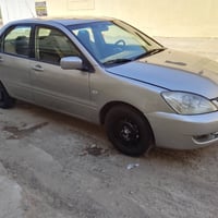 شباب لانسر شركة عامه موديل 2010 مكينه 1600وكير وسدر أمامي وخلفي تبريد ...