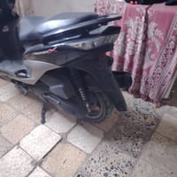 دراجه مكفوله برغي مامفتوح مديل٢٠٢٥المكان بغداد07708840607