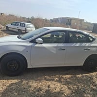 نيسان سنترا موديل 16رقم بغداد انكليزي بسمي سياره نضيفه وجاهزه مكاني بل...