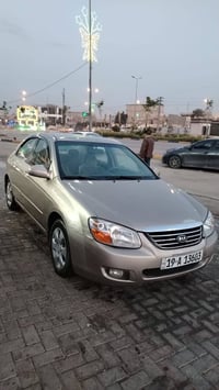 كيا اسبكترا • ٢٠٠٩ • قطعتين صبغ