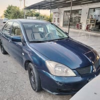لانسر ٢٠٠٩ • ٣٠٠٠٠٠ كم • أربيل