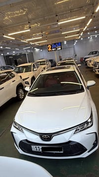 كورلا ٢٠٢٥ هايبرد شكل الخليجي داخل جلد احمر كرسي كهرباء ٣ طكات مكفولة ...