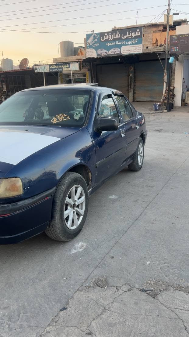 سەرە تا  بەناوی خوا
     ئۆپڵ فیکترا 🚗 مەکینە 20
      مۆدێل 1995.  سلایت . ABS. Airbag
سەیارەکە زۆر خاوێنە . گێرو مەکینە بەشەرت
چوار تایەی  مام ناوەند. تازە بۆیاغ.  پێشو پشتی کەپسە. واتا لێدراوی نیە.  خایسی نیە.
قفل مەرکەزی. کارە بایی کامل  ئیش ئەکا.
گەچەکانی هه مووی  ئیش ئەکات. تەوافە. زۆر مەزبووتە.  سەیارەکە  کامل جایزە. کامل بەشەرت.  تەقەو رەق ش  بە شەرت.
سەیارەکە بڕاوەیە بەڵام زۆر باش توند کراوەتەوە. هیچ تەقیوی نیە.  
نرخ. 14 گەڵاو. مامەڵەیەکی برایانە.***********.  تکایە گەر مشتەری نیت بێزارمان مەکە رانية, السليمانية
