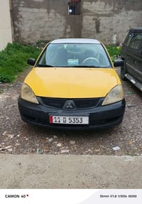 لانسر 2010 رقم بغداد مصفره هيئه وغرامات شرط التحويل ضررها جاملغ فقط مك...