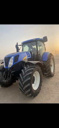 مكينه نيهولاند 70/40الفين2008فول نضافه07826786580