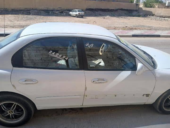 السلام عليكم 
سوناتا موديل 2000 رقم دهوك الجديد وكالة باسمي السعر 30 ورقة وبيها مجال للاستفسار ***********
***********
