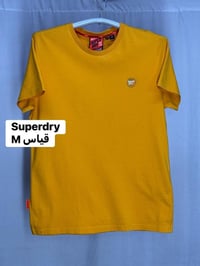 تشيرت  ( Super dry )  سوبر كريم القياس   M ما مستخدم  النظافه 💯/💯    ي...