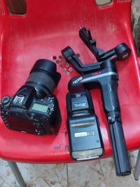 نيكون D7100 • شاحن وبطارية • فلاتر ٢