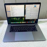 MacBook Pro 2018 Display 15" Core i7 Ram 32 GB SSD 1 TB GPU 4 GB الملح...