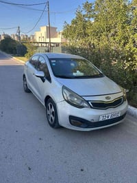 كيا ريو خليجي رقم بغداد بسمي هزه وسنويه جديده محرك ١٦٠٠دوش كير اوتومات...