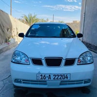 سياره اوبترا للبيع  موديل 2004 كير عادي مصبوغه حزام للجماليه  تخم تاير...