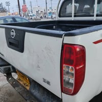 نيسان نافارا • السنويه منتهيه • باب خلفي مصبوغ