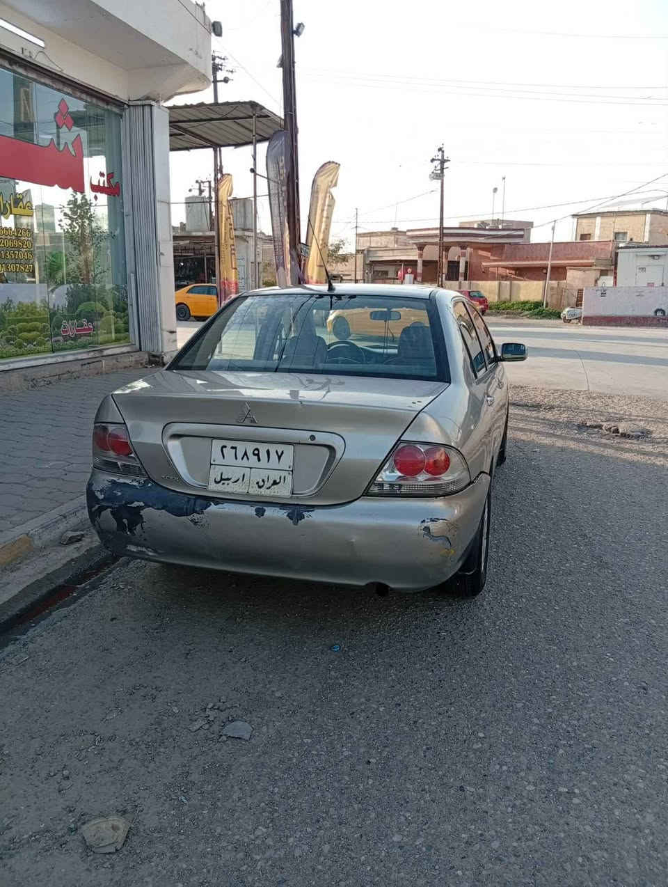 ليدراوي كه مي هه يه له به شي پشته وه 
ته قه و ره قه و گيرو مه كينه ي به شه رت 
بؤياغ عامه له سه ر كال بونه وه 
2010ي مه كينه گه وره يه 
ژ.م ***********
*********** Singapore
