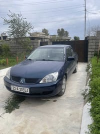 لانسەر لۆ فرۆشتن مۆدیل ٢٠٠٨ سەبوخ حیزامە  مەچەینە گەچەکەیە سەحەری ٦٤ و...