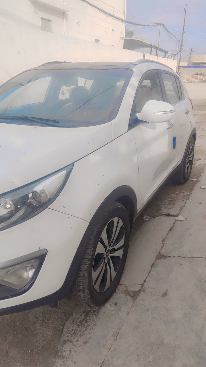 سياره سبورتج موديل 11 محدثه 15 بيها اربع كير محرك الحمدلله 
رقمها بغداد باسمي اريدها 130 هذا رقمي ‏‪0780 528 3286‬‏
