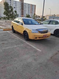 للبيع اوبتراتكسي شركه عامه موديل ١١ رقم صدامي بغداد  مشايه ١٥٠الف ممسج...