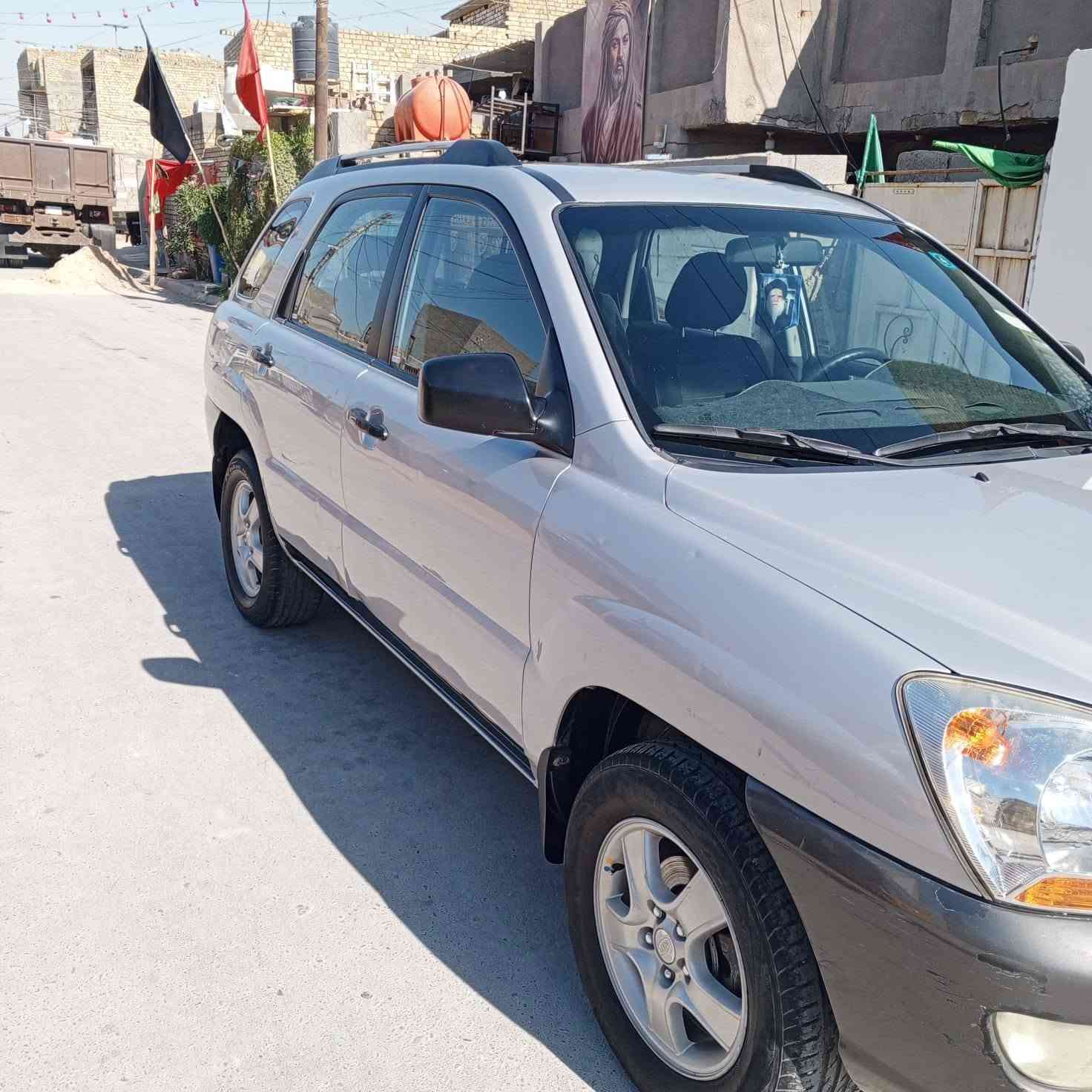 السلام عليكم سياره سبورتج 2006 سياره مال بيت جانيها 7سنوات محرك 2000دوش المرغوب مكفوله كير محرك شركه برغي ما مفتوح  عل ابلاد  تبريد ثلج حداديه صدر كهربائيات كلها شغاله رقم بغداد هزه سنويه بسمي شرط تحويل بيها جاملغ أيسر امامي وباب السايق رش صبغ وبنيد بارد علئ قد شبر فقط السعر 100 مكاني بغداد العبيدي وبيها مجال قليل حك الجية رقم الهاتف ***********
