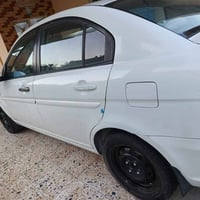 أكسنت ٢٠١٠ خليجي بيها صبغ البابين جهة اليمنى اثر طخه بسيطه للإستفسار ا...