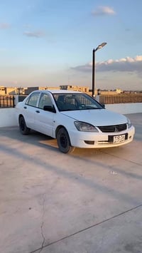 ميتسوبيشي لانسر • ٢٠٠٩ • موصل القیارة