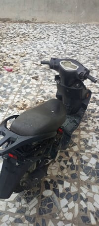 عندي هاي الدراجه للبيع سكنز محرك ماكس صيني دراجه ولا غلطه بس يحتاجلها ...