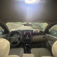 عندي نيسان سني ياباني 2008 محرك قبق اسود لون ابيض صدفي بيها راس جاملق ...