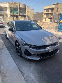 كيا/k5/ جي تي لاين موديل 2023 اللون اسمنتي وارد امريكي ماشية 47 الف بد...