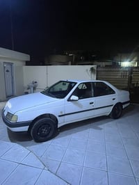 بيجو 405 GLX • رقم بغداد • باسمي