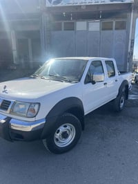 نيسان • دبل اكسل • ٢٠٠٣