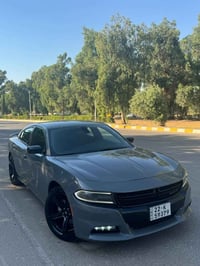 تشارجر SXT • محرك V6 • ١٦٥ ألف ميل