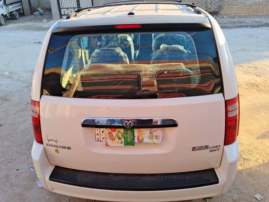 دوج كرفان موديل 2009 رقم بغدادانكليزي باسمي تحويل مباشر للاستفسار ***********
