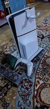 ps5سلم اوربي مساحه التخزين 1تيرا ويا يدتين اصليات +قاعدتين تبريد وقاعد...