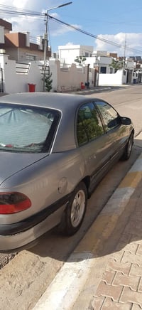 اوبل اوميكا بزون رقم اربيل محرك ٢٠ قبغ اسود تبريد اوتوماتيك السعر ٣٨ و...