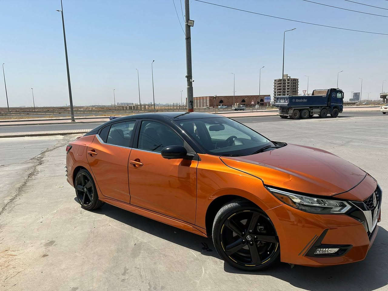 السلام عليكم
للبيع  
نيسان سنترا  SR موديل :2022 رقم اربيل بأسمي  
السعر :170 وبيه مجال  بسيط
اللون : مشمشي مميز 
حجم المحرك : .2.0L( 4,سلندر )
سياره كامله و جاهزه دينار متصرف
 ملاحظة السيارة : حادثه حافة البنيد فقط ربع بنيد صبغ مثل 
مموضح بالصورة  
و بابين عكس جهة سائق كلير

بدون دواخل 100%
ايرباك كله سليم 
المواصفات : 𝐒𝐑
فول مواصفات  
 ابواب بصمة
بصمة تشغيل 
تشغيل عن بعد (Remote Start)
شاشة  ايباد
كاميرة 
اوتو ستارت Auto Start
اوتو ستوب Auto Stop‎
رادار امامي (تحديد مسار)
رادار جانبي  (نقاط عمياء)
رادار خلفي (التحذير من الاصطدام)
حساسات امامي
حساسات جانبي 
حساسات خلفي 
نظام : Eco
نظام : Normal 
نظام : Sport
كشنات جلد
كشنات كهربائي
تحكم استيرن  
لايتات LED زينون بيلادي
بكلايتات LED  بيلادي 
ويل كروم
بعد هواية مواصفات…
‏‎تفاصيل اكثر الاتصال علی الرقم   
***********
واتساب 
 

‏‎
