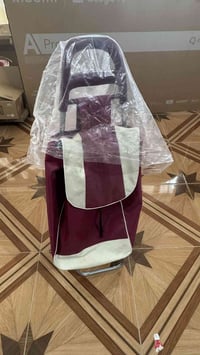 عربة تسوق • مغلفة نايلون • بيها مجال