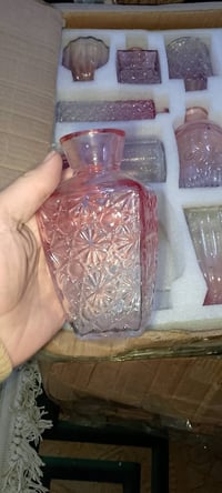 ١٢ قطعة • فازة زجاج • توصيل