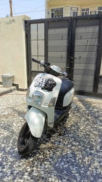 بوليس رقم بغداد انكليزي باسمي للبيع هزه جديده والدراجه باسمي تحويل ثان...