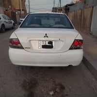 لانسر 2011 • رقم بغداد • كير ومحرك جديد