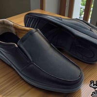 حذاء رجالي • جلد • أسود وحني