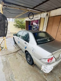 لانسر ٢٠٠٧ سنوية جديدة صدر جديد كير ومكينة بل نايلون بيهة صبغ احزام وض...