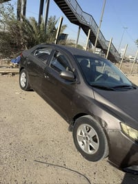 سيارة سيراتو 2012 رقم بغداد لون نفطي بأسمي نفاذ السنوية لغاية 2027  ار...