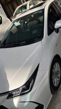 كورلا 2025 هايبرد ماشية الفين  مكفولة كفالة عامة بحالة الزيرو غراضهة ك...
