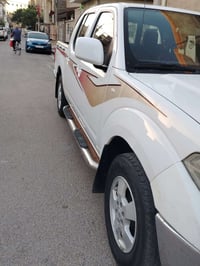 بيكم نيسان موديل 2014للبيع رقم واسط مشروع وطني  مكفولة عامه من مكينه و...