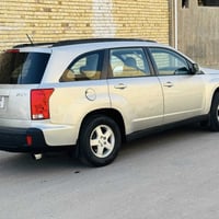 سازوكي XL7 • محرك V6 • ٧ راكب