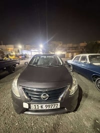 نيسان فيرسا 2015 رقم بغداد مميز مكينة كير كفالة صدر جديد  تخم تاير جدي...