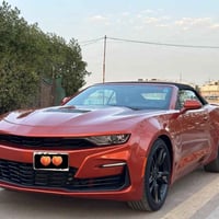 كمارو 2023  ‏Ss 6200  كشف  لون مشمشي مميز ونادر ماشية 15,000 ميل كشنات...