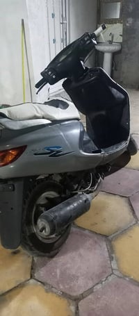 فراشه مفتوحه • موتوسيكل • كوفه