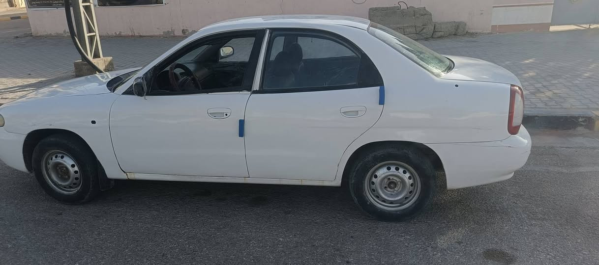 دايو نوبرا 1 مديل 99
‏سيارا بسمي رقم انكليزي 
‏كير ومحرك  كورلا ... اوتماتيك 
‏مفروشة عازل صوت وعازل حراري 
‏ضغيره كامله جديده
‏تنكجيه كامله على اخر حبايه
‏مصبوغة عام داخل وخارج  فرن
‏ضايفلها حساس بك 
‏سيارة حلوا 
السعر 38 وبيها مجال
‏للستفسار ***********
‏مكان السيارة نجف حي الزهراء النجف, العراق
