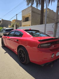 للبيع او مراوس  دوج جارجر 2017 sxt محرك 3600 لون  احمر تو ويل شاشة كبي...