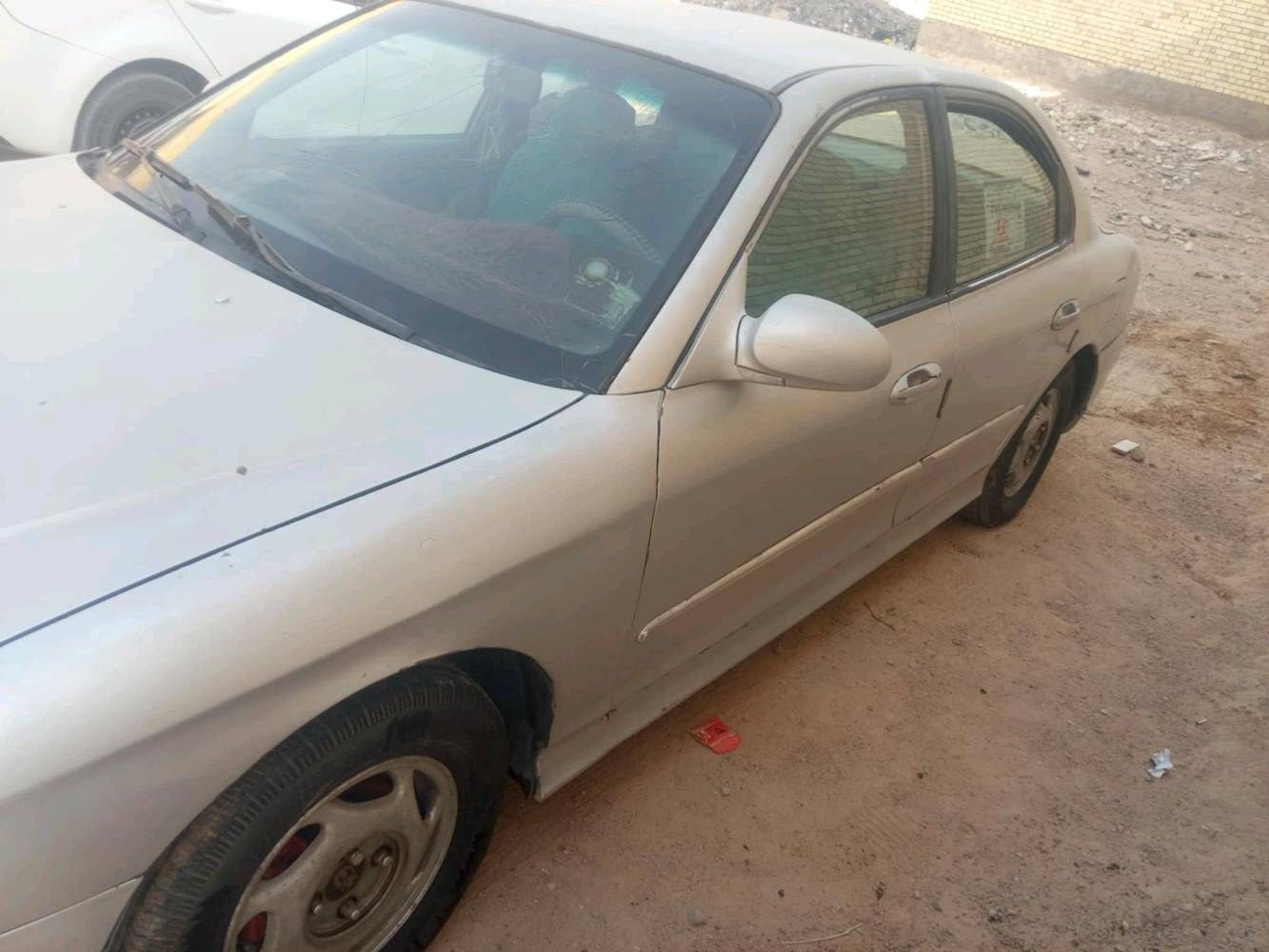 سوناتا للبيع موديل مثنى٢٠٠٠بدون صبغ مكينة بيها خيط بخار تخم تاير حدادية بيها كتاب من الكمارك معنون إلى المنطقة الجنوبية سنة ٢٦ معاملة كاملة من السماوة وراعيها الشرعي ابو السنوية مااندلة داخلة عن طريق طريبيل بدون قرص السيارة أصولية مكان السيارة غماس وإذا اكو مراوس  بس رقم انكليزي