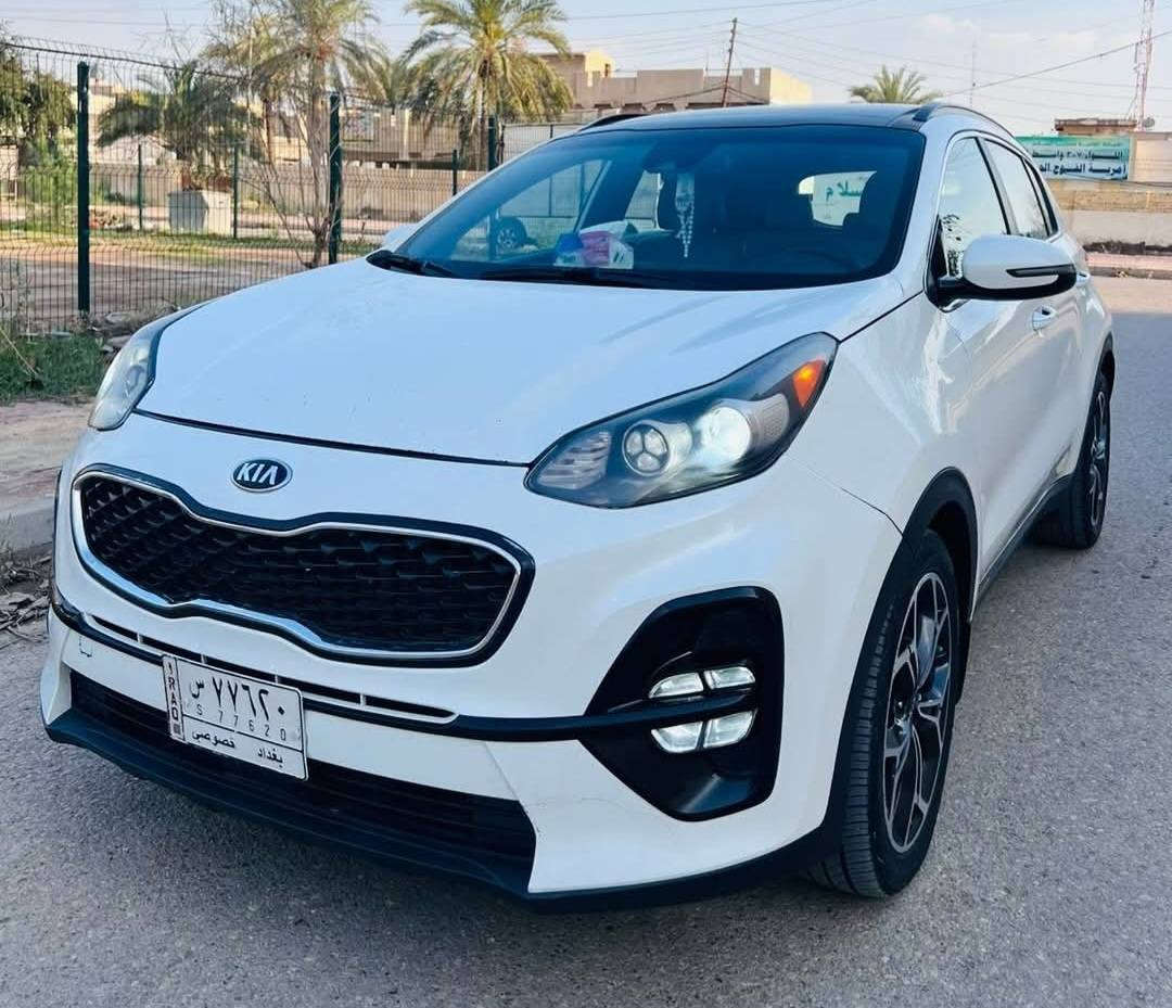 ‏Kia Sportage SXL 2000 Turbo 2021   سبورتج 2021 وارد امريكي لون ابيض رقم بغداد حرة باسمي  السيارة اني مستوردها ع ايدي حادثها تبديل جاملغ وبنيد ايرباك ستيرن فقط ماشية تقريبا 83 الف ميل السيارة فووووول مواصفات 1/1 فئة SXL    مواصفاتها  محرك 2000 تيربو دبل كزوز   / سقف بانوراما قطعتين / بصمه ابواب و تشغيل و صندوق / ستيرن حرف دي تحكم ستيرن كامل / تبريد امامي خلفي / شحن لاسلكي / كشنات جلد لونين كريمي واسود + الاماميات كهرباء تدفئة وتبريد / تدفئة استيرن / انارة داخلية لد / رادار امامي + جانبي مرآة + خلفي  / لايتات زينون عالي ناصي + بك لايت لد / سيتم سماعات 10 سماعة هارمن كاردن صوت مرعب  / سايد بريك كهربائي (بصمه) / اوتو هولد / شفتات ستيرن / شاشة كبيرة بلادية / اشاير مرايات جانبية + شفط  /ويل 19 بلادي كروم / رادار خروج عن المسار  ...  وبعد هواي بيها مواصفات    رايدها 167$وبيه مجال للشراي غير متواجد ع الفيس للاستفسار الاتصال ***********
